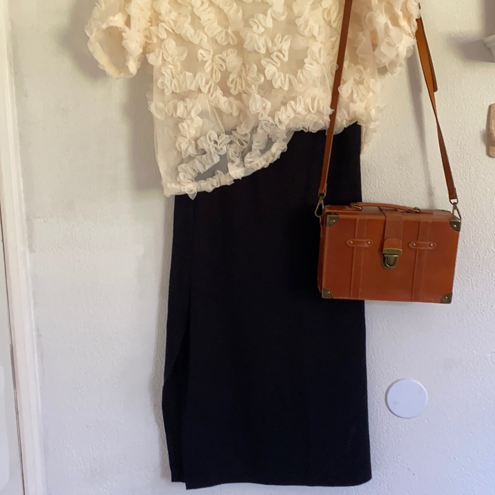 Black knee length pencil skirt with side slit